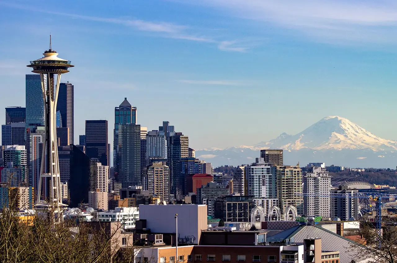 Seattle skyline with Mount Rainier in the background on a clear day.
